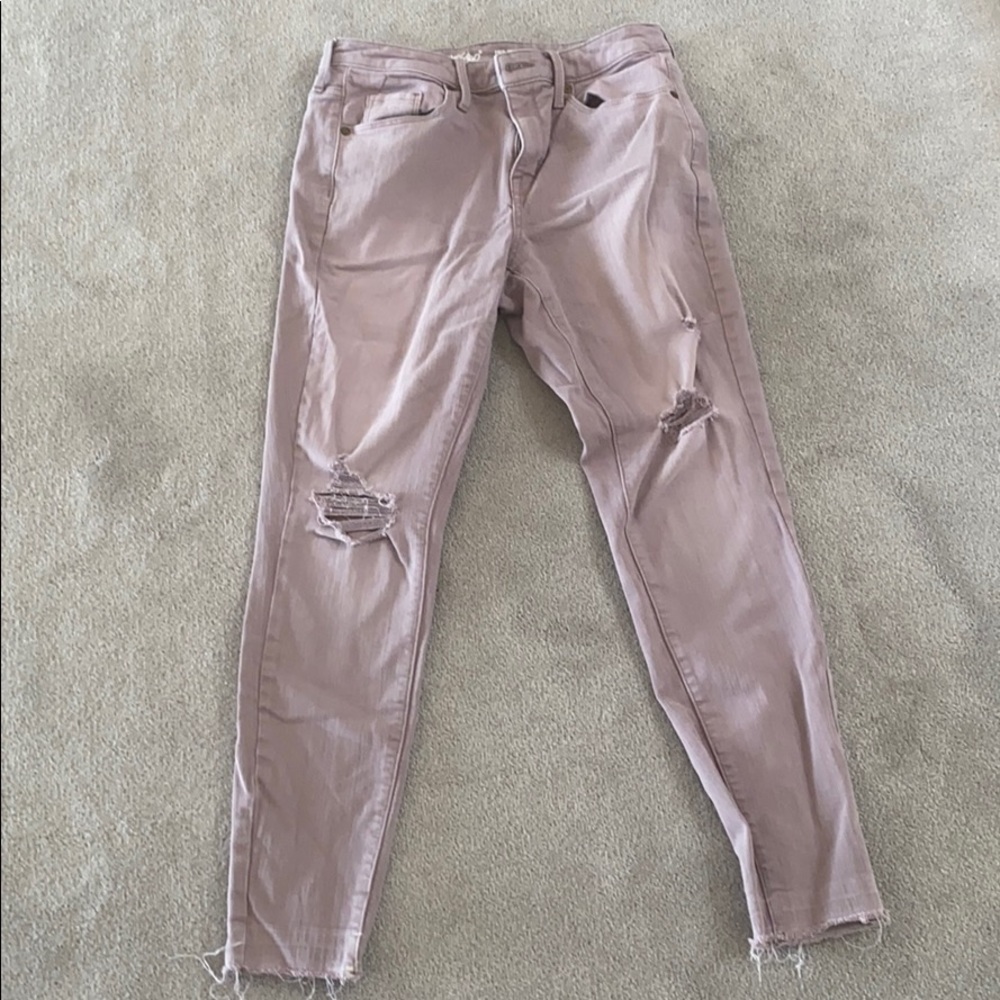 Pink distressed skinny jeans